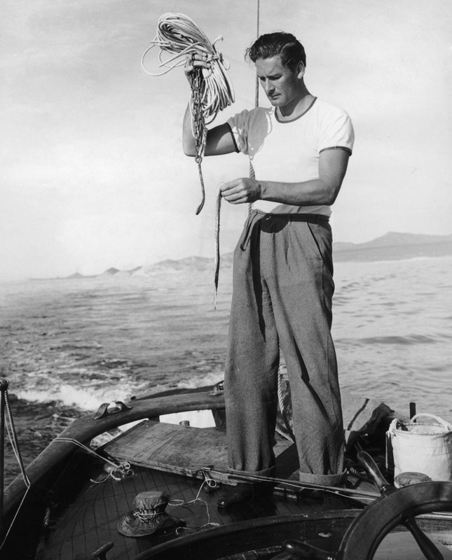 Эррол Флинн на своей яхте 1940