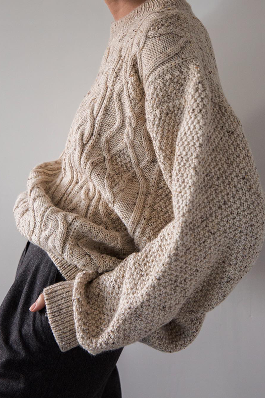 Модный свитер с косичками  фото тренда зимы 2019