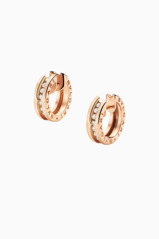 Минимализм серьги Bvlgari из розового золота с бриллиантами.