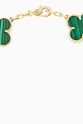 Украшения Van Cleef  Arpels Alhambra из малахита желтого золота и бриллиантов | Vogue
