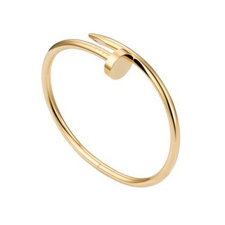 Браслет из желтого золота Juste un Clou Cartier.