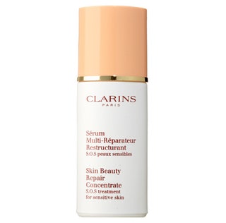 Восстанавливающая сыворотка для чувствительной кожи с натуральными экстрактами Skin Beauty Repair Concentrate Clarins.