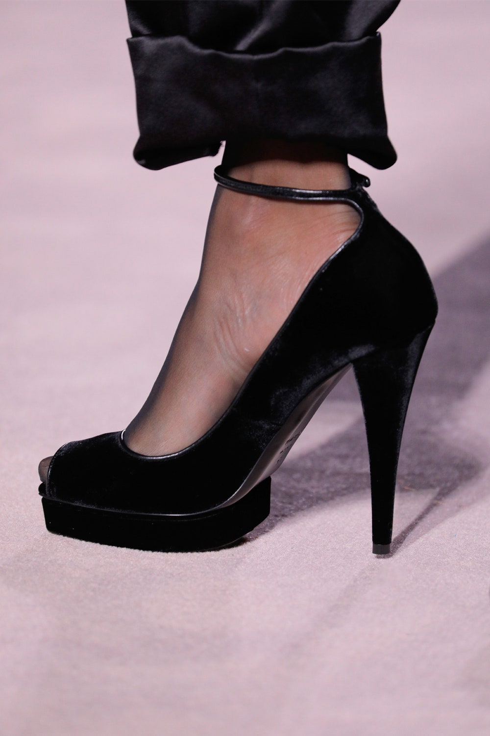 NEW YORK NY  FEBRUARY 06  A black pump velour shoe detail on the runway at the Tom Ford Runway show February 2019 during...