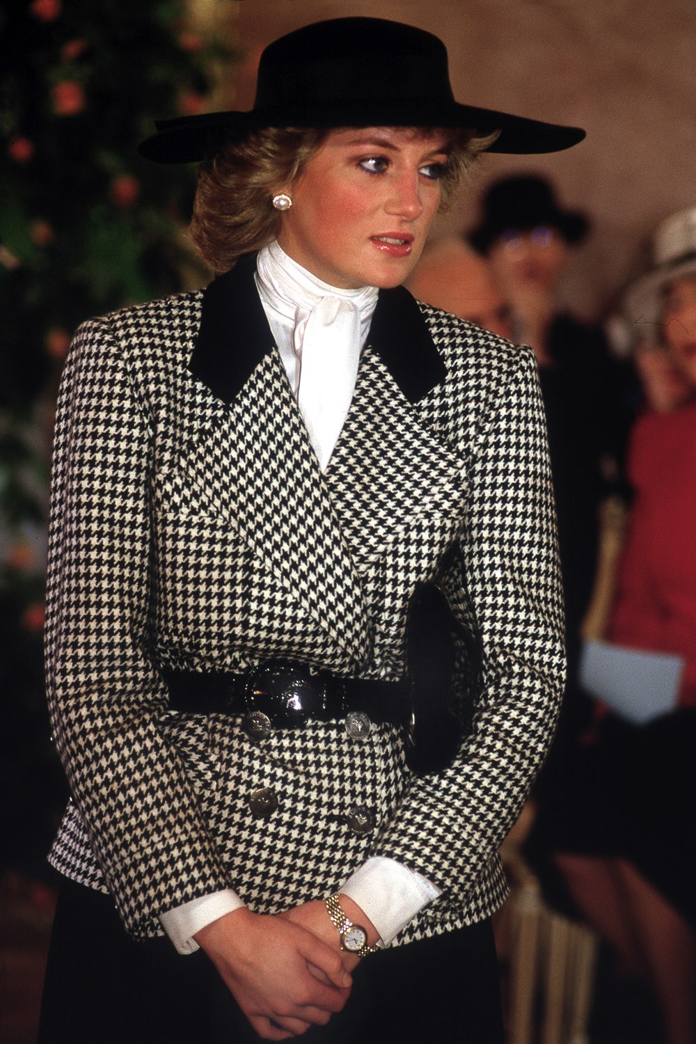 The Princess of Wales arriving at a reception at the ctiy hall in Munich November 1987. She is wearing a checked suit by...