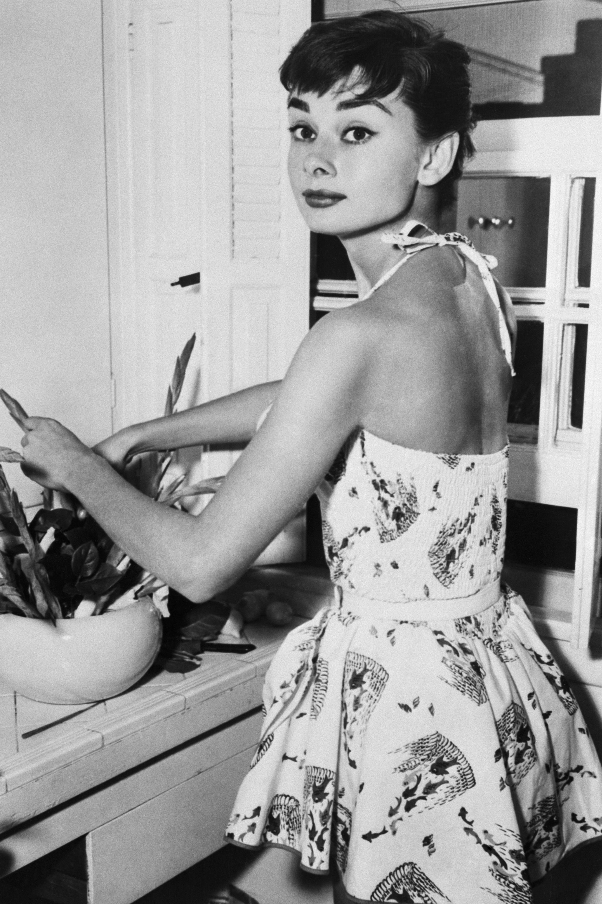 6301954New York NY Pixyish Audrey Hepburn Academy Award actress beats the Manhattan heat with a cool play suit as she...