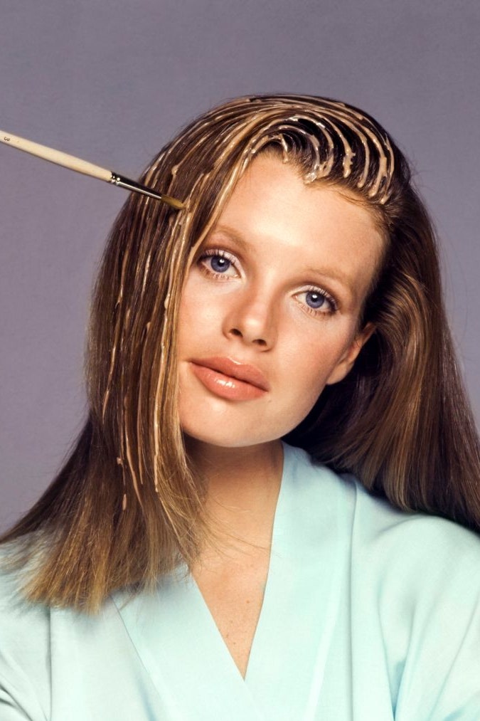 Hair coloring demonstration front view of model Kim Basinger.