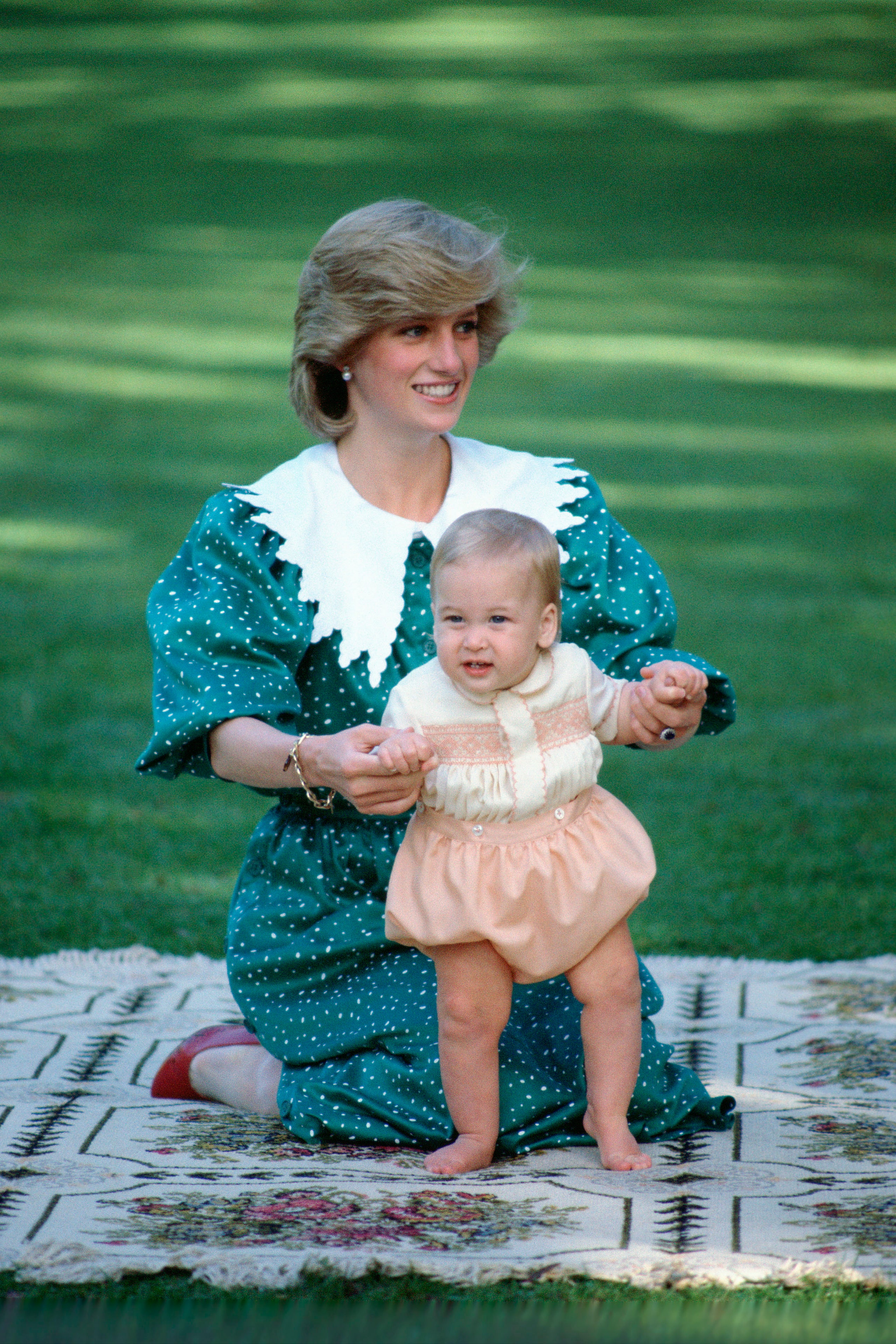 AUCKLAND NEW ZEALAND  APRIL 18  Diana Princess Of Wales Sitting On A Blanket Holding Her Baby Son Prince William So He...