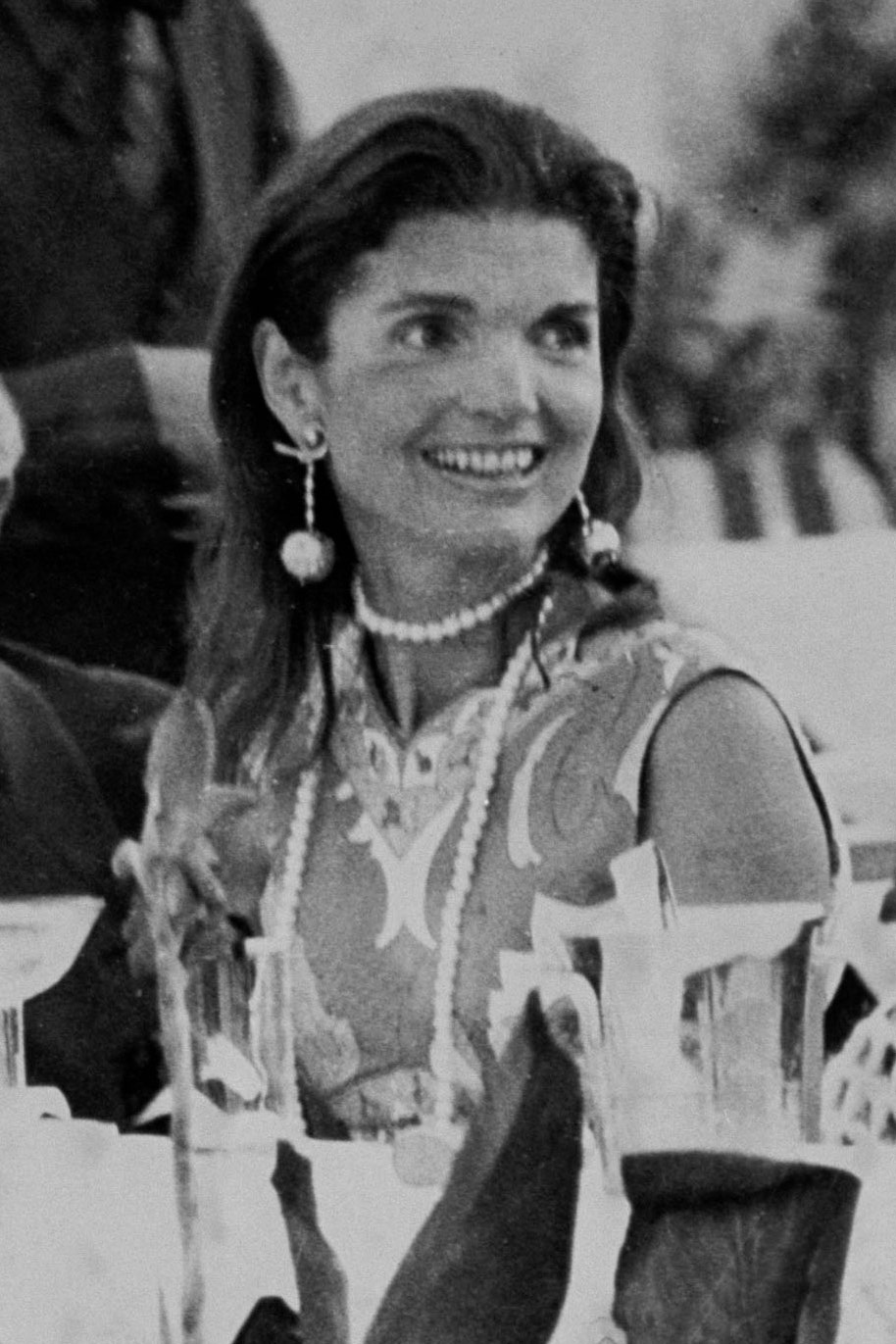 Greek shipping tycoon Aristotle  Jackie Onassis  sitting at table celebrating 1st anniv. of their marriage w. friends at...