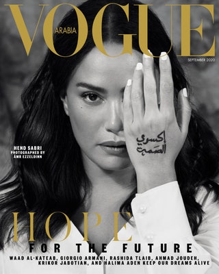 Image may contain Magazine Human Person Tabloid Tattoo and Skin