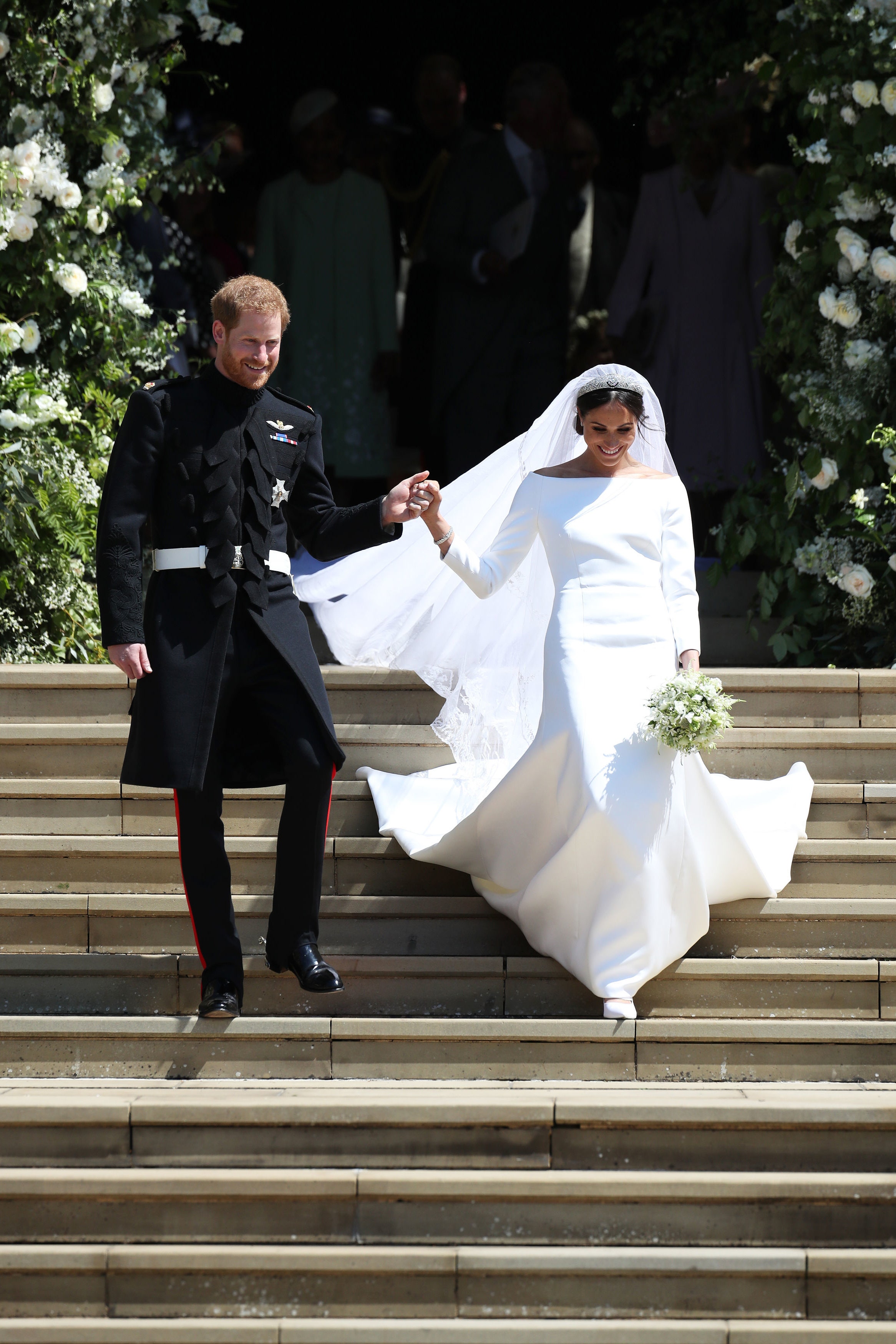 WINDSOR UNITED KINGDOM  MAY 19  Prince Harry and Meghan Markle leave St George's Chapel after their wedding in St...