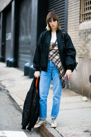 Image may contain Edie Campbell Clothing Apparel Footwear Shoe Pants Human Person Jacket Coat Denim and Jeans