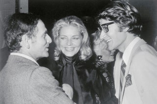 Pierre Cardin with Yves Saint Laurent and Lauren Bacall.