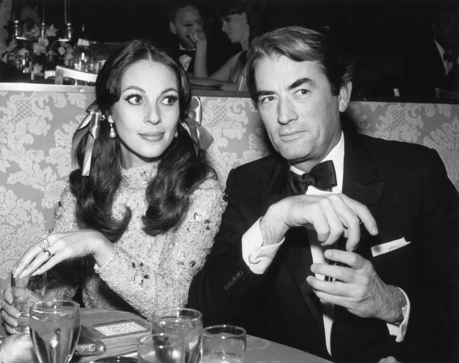 Image may contain Gregory Peck Human Person Tie Accessories Accessory Clothing Suit Coat Overcoat and Apparel