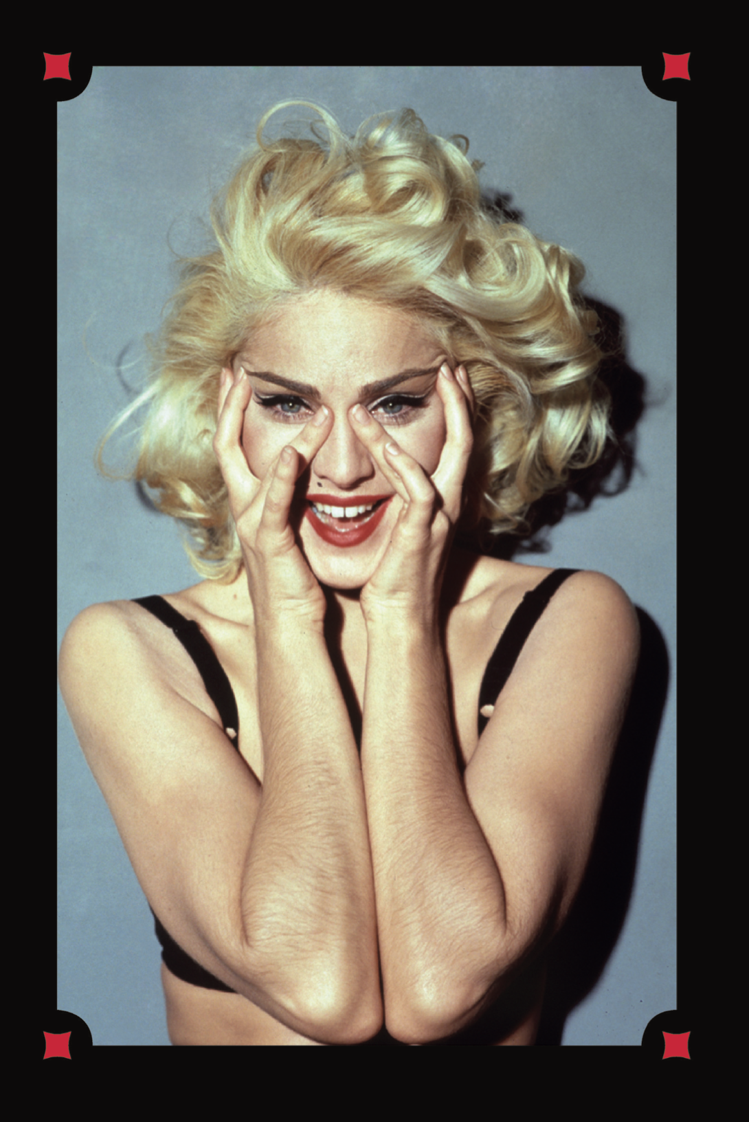 Эта фотография сделанная для промоушена музыкального альбома запечатлела модные приемы которыми Мадонна пользовалась на...