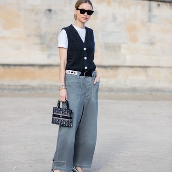 PARIS FRANCE  FEBRUARY 25 Pernille Teisbaek is seen wearing vest wide leg grey pants Dior bag outside Dior during Paris...