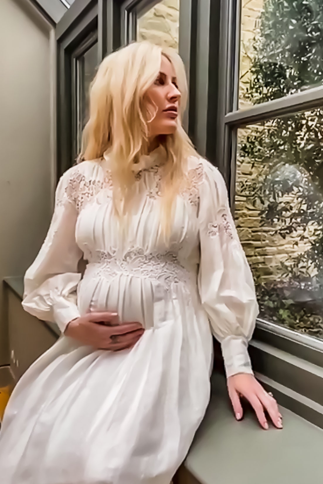 Ellie Goulding pictured at her home in Gloucestershire wearing a linen lace dress from the Alberta Ferretti Spring 2021...