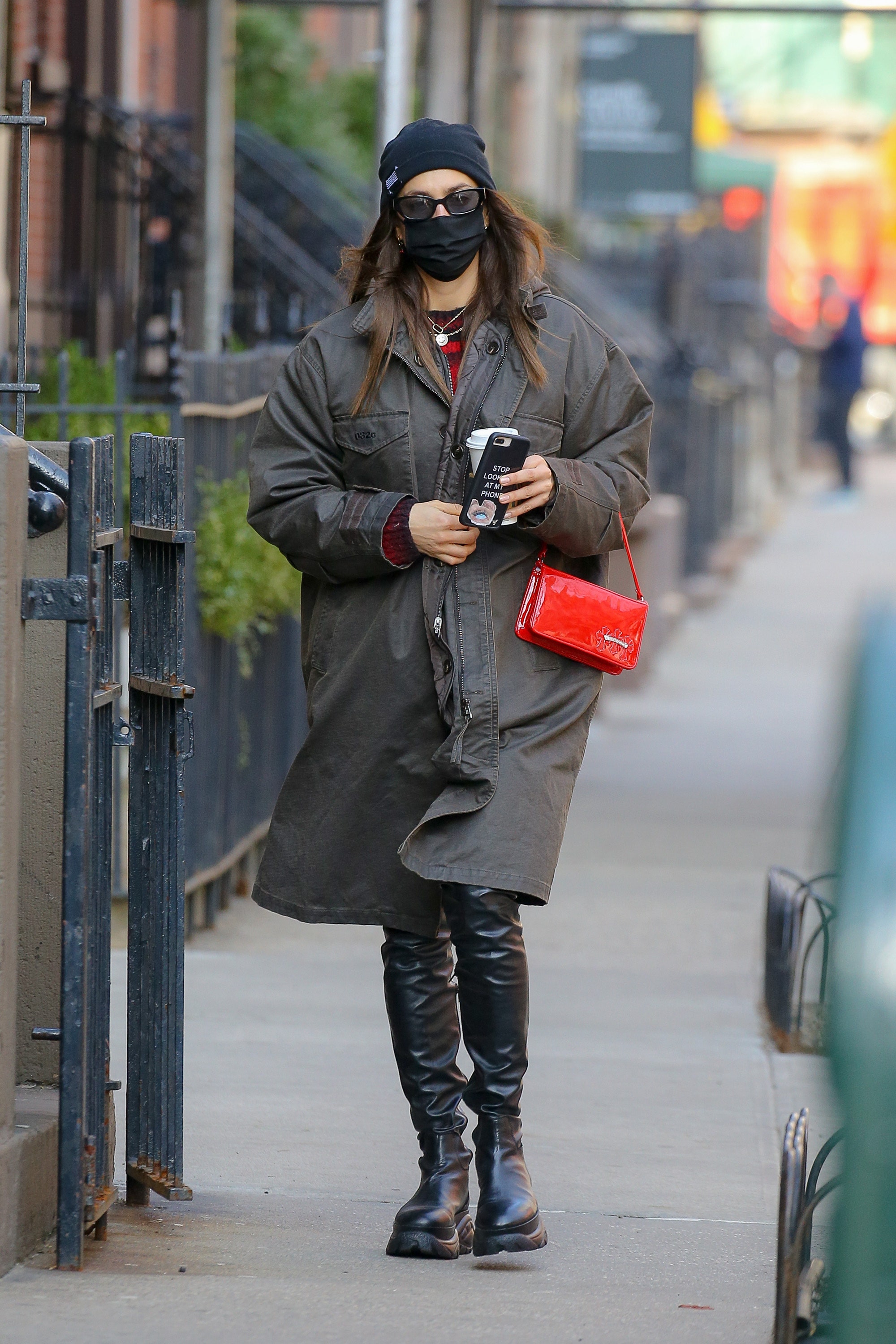 Irina Shayk look stylish in a black leather pants with a striped red and black top while out and about in NYCPictured...