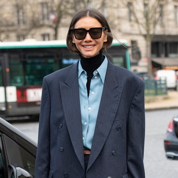 PARIS FRANCE  MARCH 02 Fashion Director at Vogue Ukraine Julie Pelipas wears Celine sunglasses Mango boots and a Better...