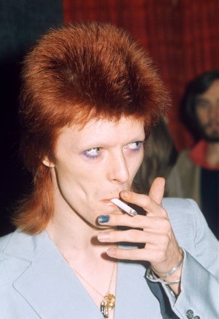 Image may contain Human Person Finger and Mick Rock