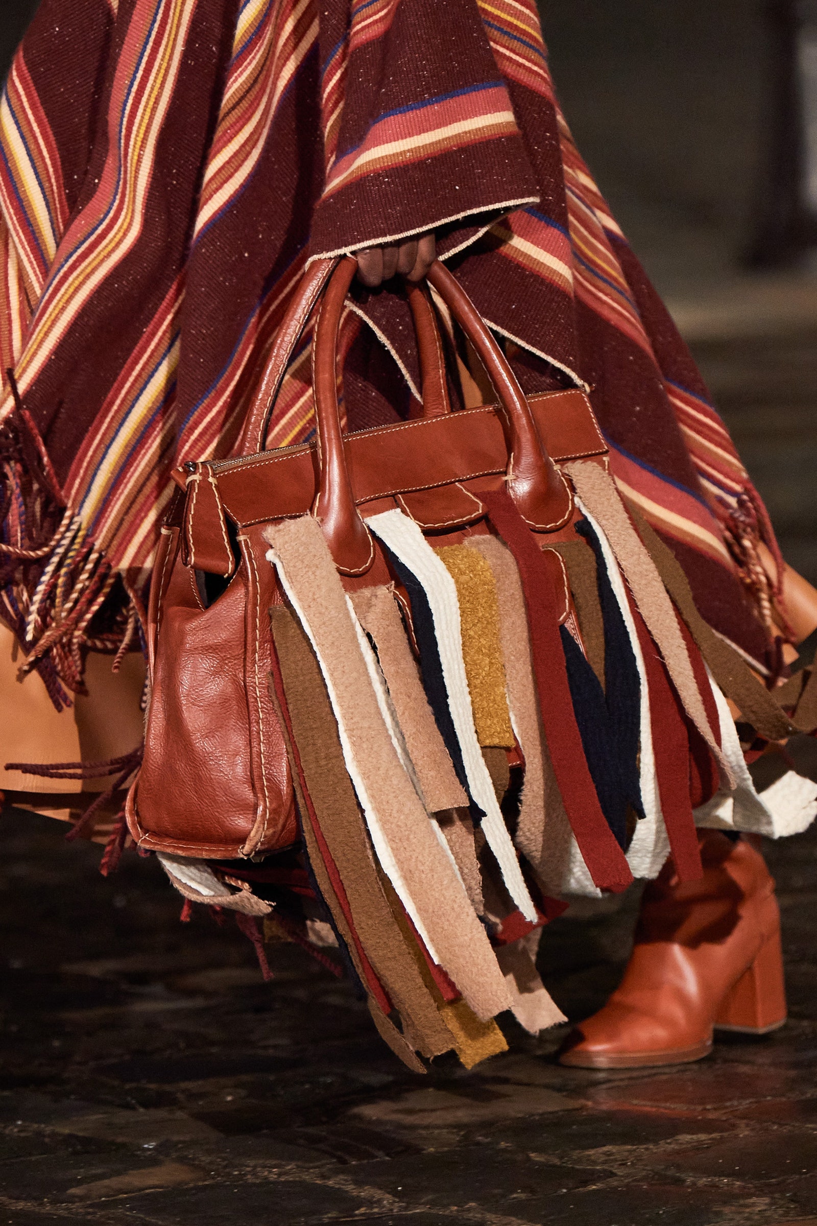 Image may contain Handbag Accessories Accessory Bag Purse Clothing and Apparel