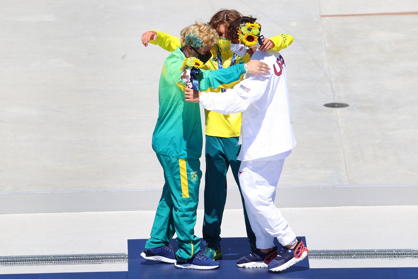 Серебряный медалист Педро Баррос  золотой медалист Киган Палмер  и бронзовый медалист Кори Джуно  5 августа 2021