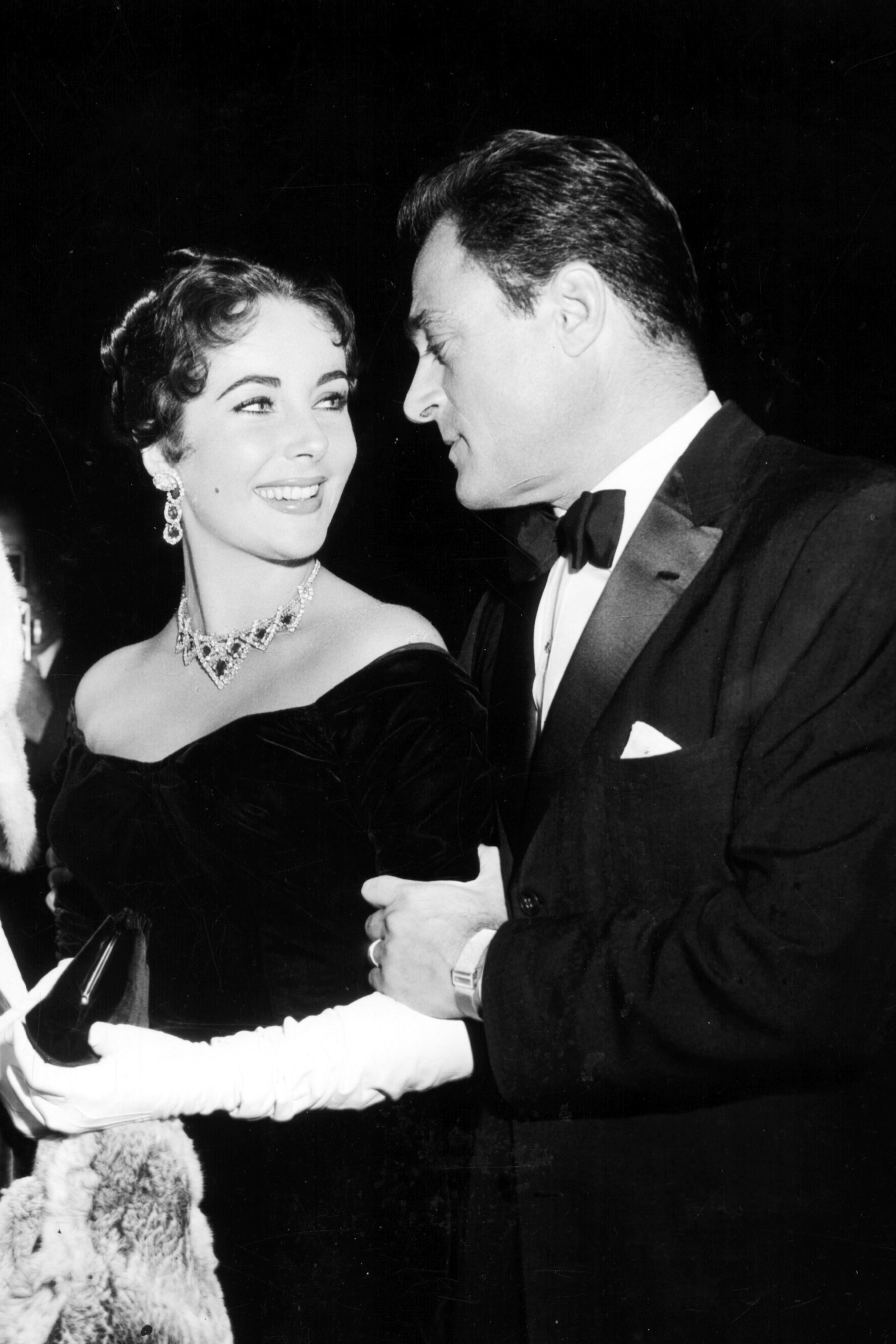 Actress Elizabeth Taylor  with third husband Mike Todd at the Premiere of 'Raintree County' 8th October 1957.