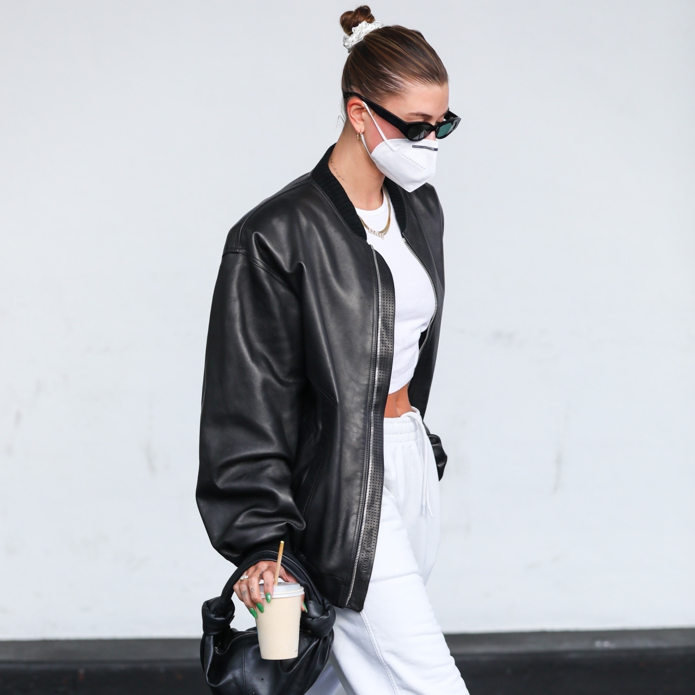 Beverly Hills CA   EXCLUSIVE   Hailey Bieber runs errands in Beverly Hills. The model made a casual exit in joggers crop...