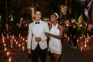 Image may contain Clothing Apparel Human Person Tie Accessories Accessory Jasmine Tookes Candle Tuxedo and Suit
