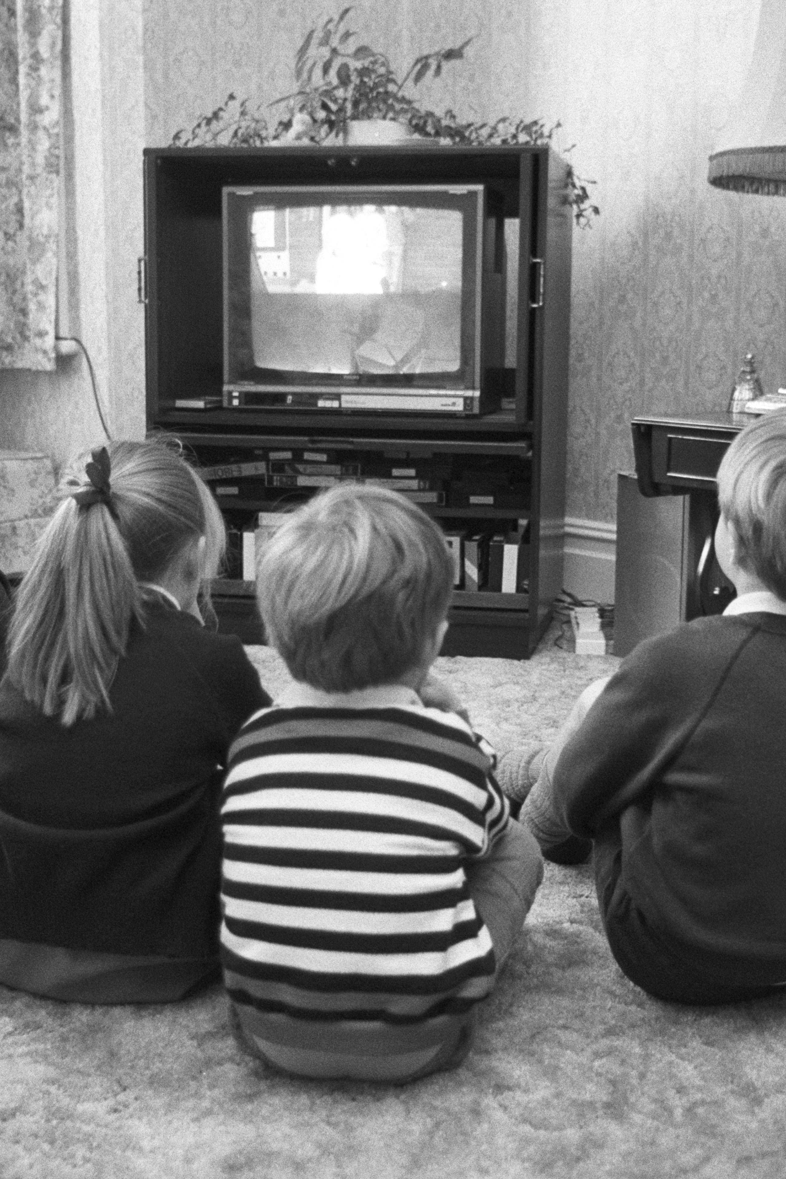 A group of young British children watching television in October 1988.