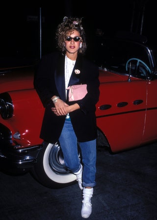 Никто не носил огромный жакет в 1980е и темные очки так как это делала Сара Джессика Паркер.