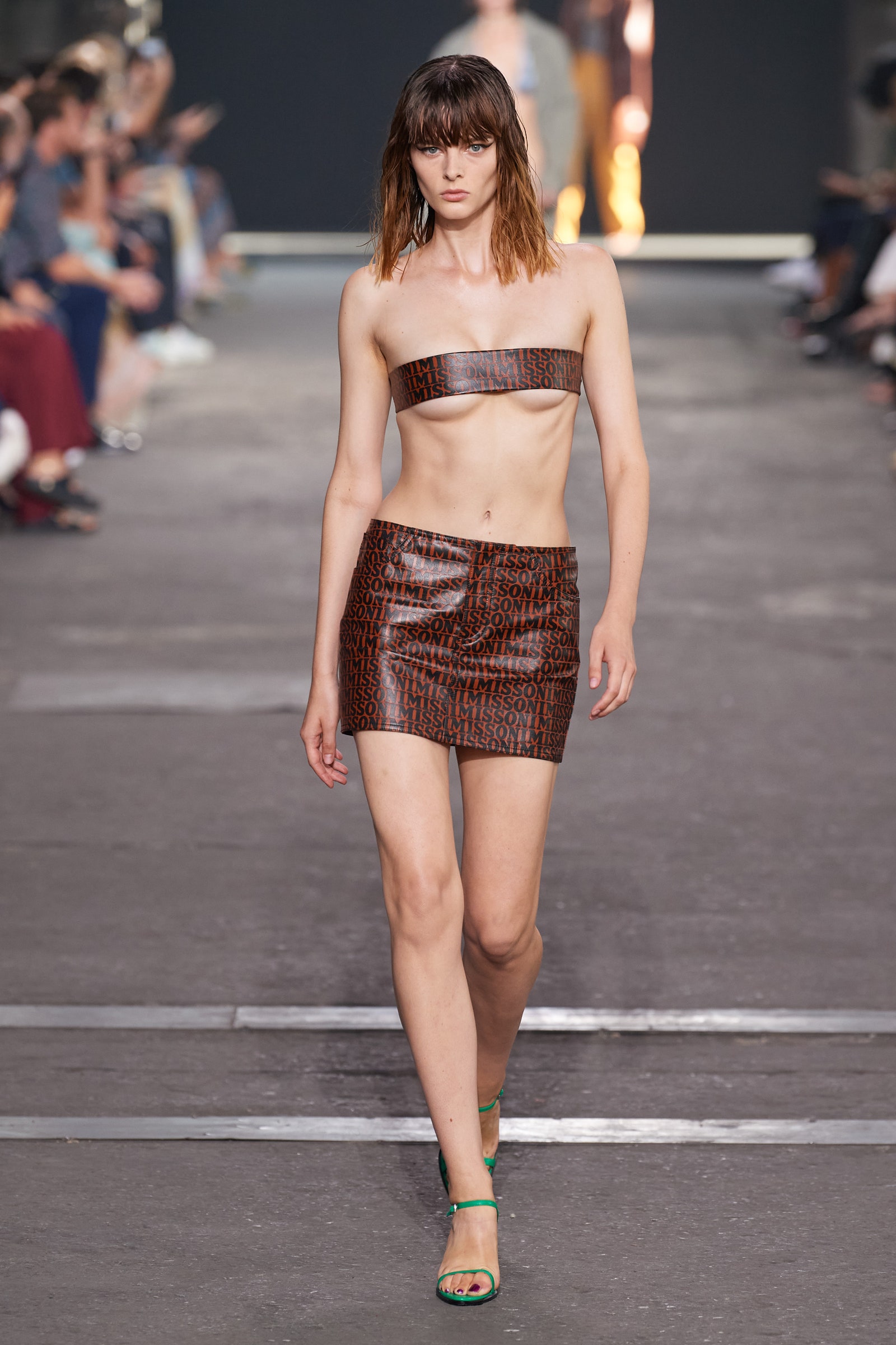 Image may contain Human Person Clothing Apparel Runway and Fashion