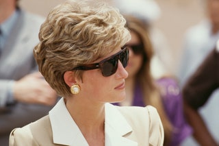 Image may contain Human Person Sunglasses Accessories Accessory Clothing Apparel Diana Princess of Wales and Finger