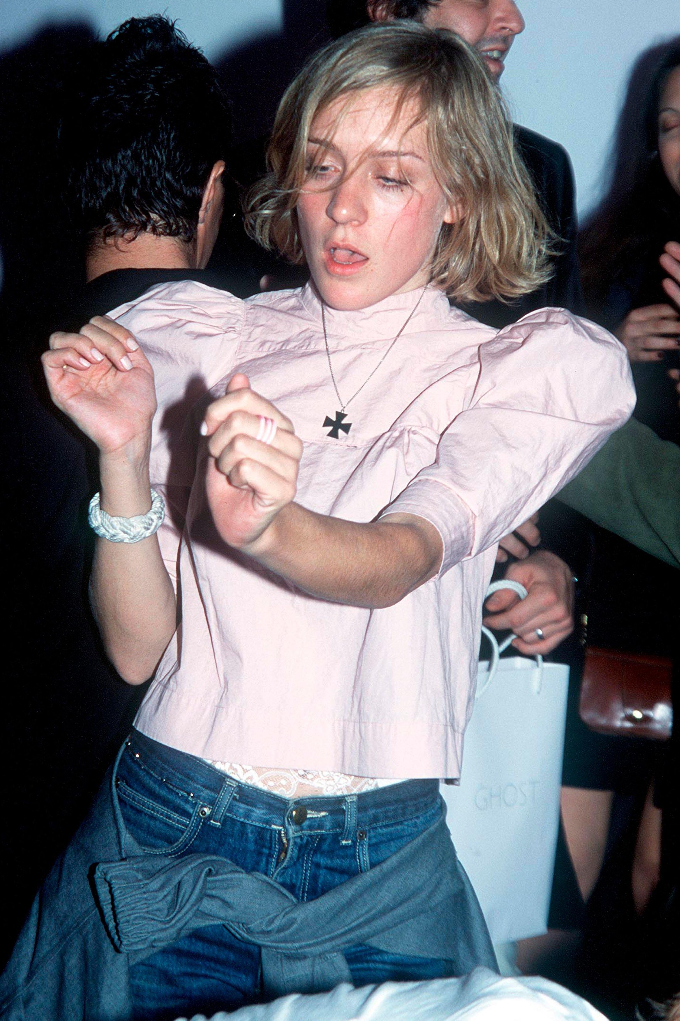 2F6RW3W May 2 2000 New York New York USA CHLOE SEVIGNY dancing during the 'Ghost' Flagship Store Opening in New York.