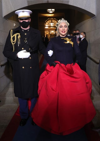 Image may contain Clothing Apparel Human Person Coat Military Uniform Military Helmet Officer Sleeve and People