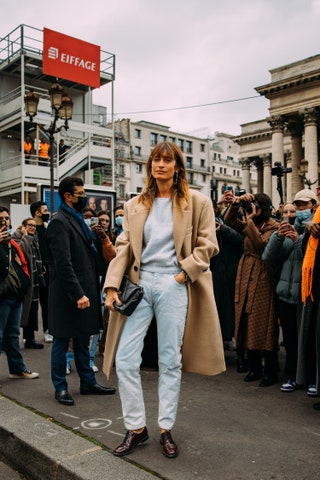 Image may contain Clothing Apparel Shoe Footwear Caroline de Maigret Human Person Overcoat and Coat