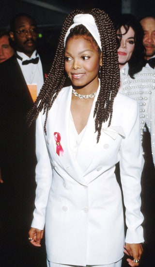 Image may contain Hair Tie Accessories Accessory Human Person Janet Jackson Clothing Apparel Necklace and Jewelry